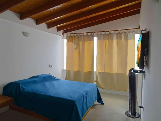 Imagen de la habitación del Hotel Akas Apartamentos. Foto 17