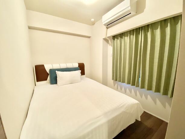 Imagen de la habitación del Hotel Akasaka Residence. Foto 17
