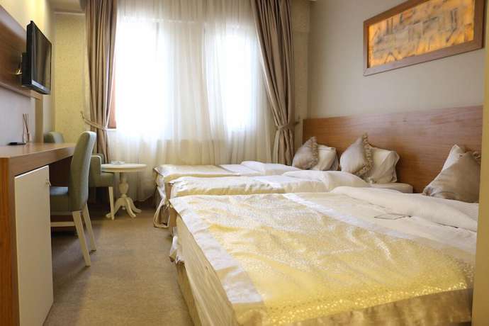 Imagen de la habitación del Hotel Akbak. Foto 15