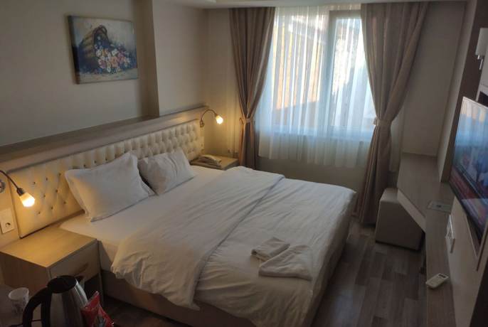 Imagen de la habitación del Hotel Akdag. Foto 14