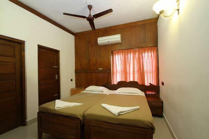 Imagen de la habitación del Hotel Akhil Beach Resort. Foto 15