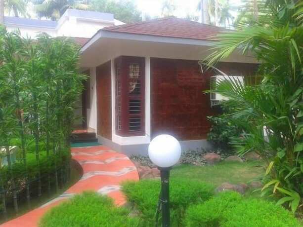 Imagen de la habitación del Hotel Akhil Beach Resort. Foto 18