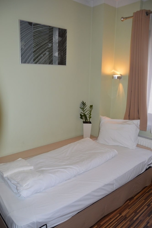 Imagen de la habitación del Hotel Akira Bed and Breakfast. Foto 14