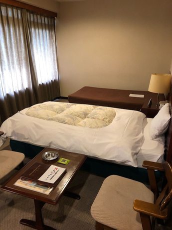 Imagen de la habitación del Hotel Akisawa. Foto 10