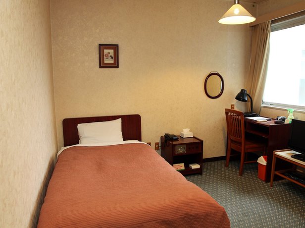 Imagen de la habitación del Hotel Akisawa. Foto 13