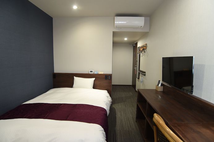 Imagen de la habitación del Hotel Akisawa. Foto 17