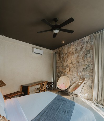 Imagen de la habitación del Hotel Akkuun Tulum Adults Only. Foto 13