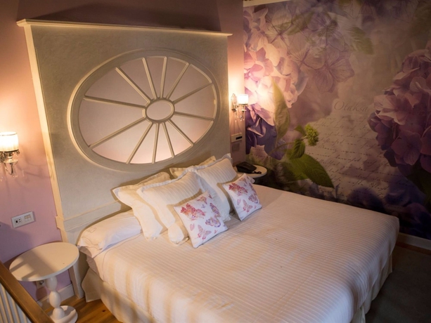 Imagen de la habitación del Hotel Akla Palacio Torre De Ruesga. Foto 3