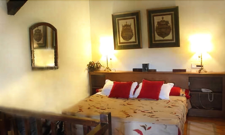 Imagen de la habitación del Hotel Akla Palacio Torre De Ruesga. Foto 13