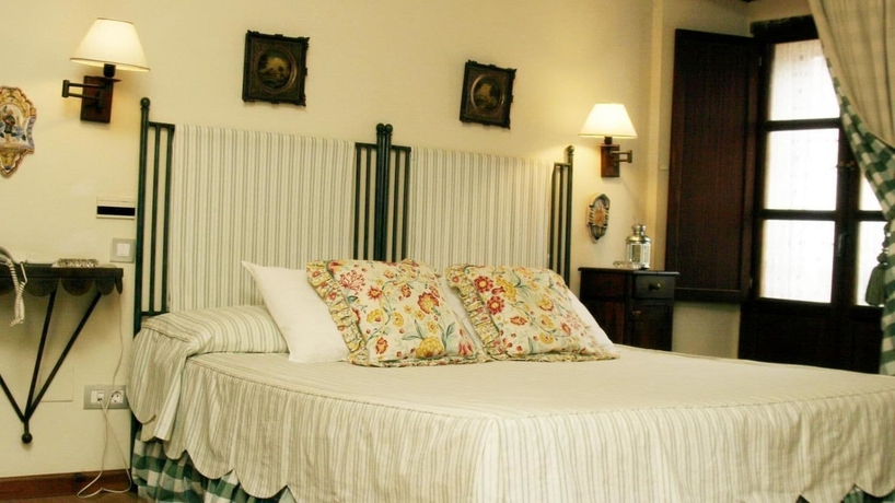 Imagen de la habitación del Hotel Akla Palacio Torre De Ruesga. Foto 19