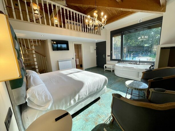 Imagen de la habitación del Hotel Akla Suites Valles Pasiegos. Foto 13