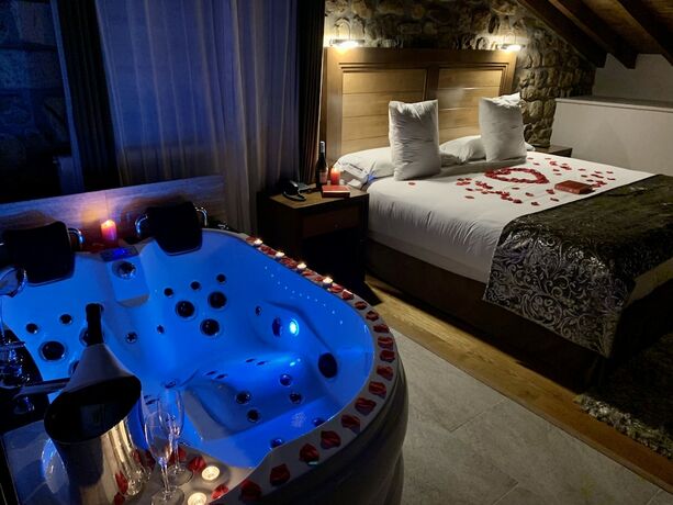 Imagen de la habitación del Hotel Akla Suites Valles Pasiegos. Foto 20