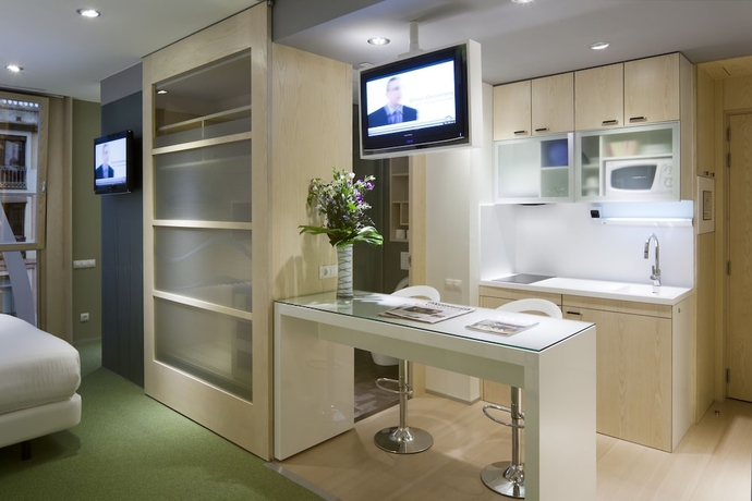 Imagen de la habitación del Hotel Ako Suite. Foto 10