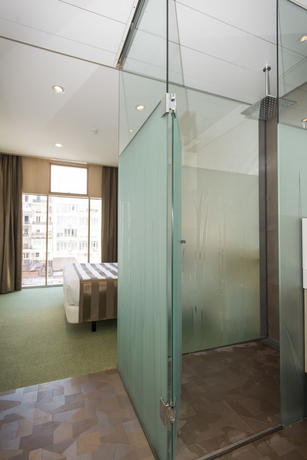 Imagen de la habitación del Hotel Ako Suite. Foto 13