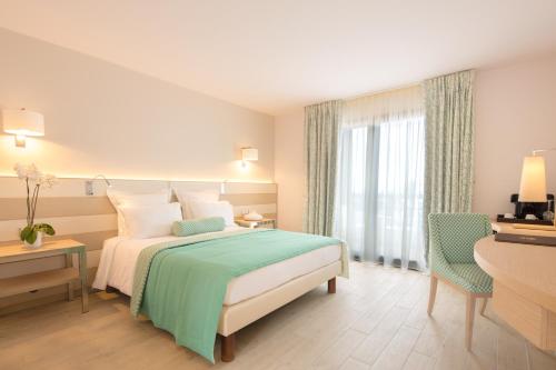 Imagen de la habitación del Hotel Akoya Hotel & Spa. Foto 9