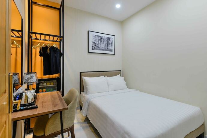 Imagen de la habitación del Hotel Akoya Saigon Central. Foto 17