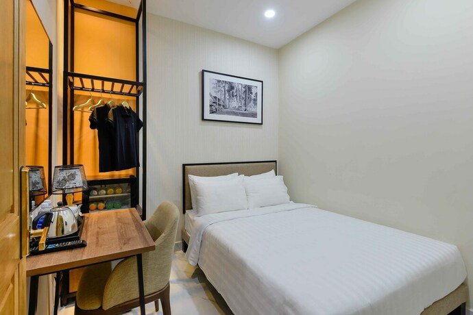 Imagen de la habitación del Hotel Akoya Saigon Central. Foto 18