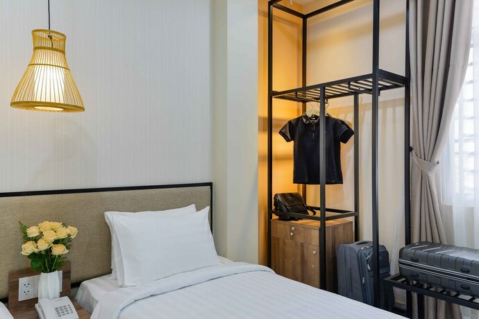 Imagen de la habitación del Hotel Akoya Saigon Central. Foto 24