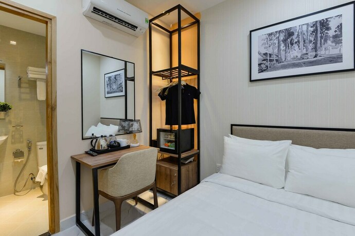 Imagen de la habitación del Hotel Akoya Saigon Central. Foto 32