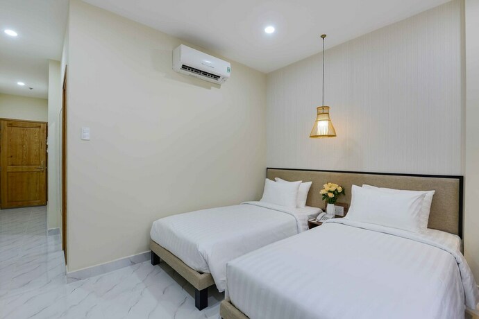 Imagen de la habitación del Hotel Akoya Saigon Central. Foto 36