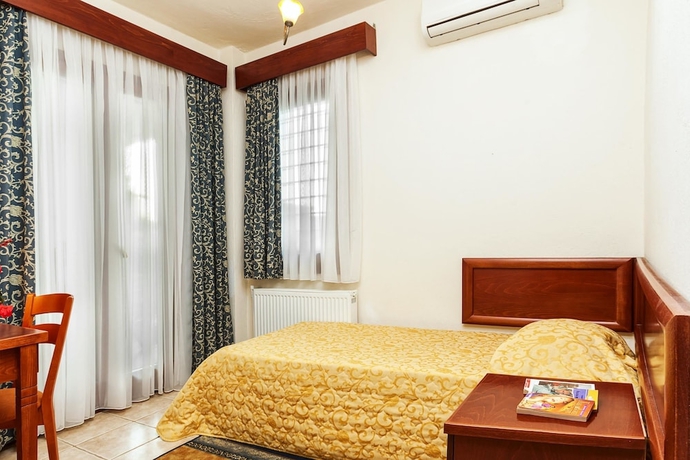 Imagen de la habitación del Hotel Akritas Ef Zin Villas and Suites. Foto 16