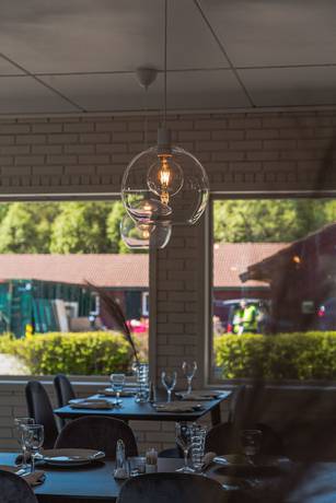 Imagen del bar/restaurante del Hotel Aksdal Inn Motell. Foto 5