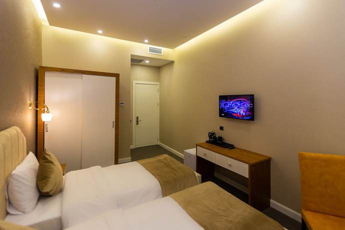 Imagen de la habitación del Hotel Aksent. Foto 2