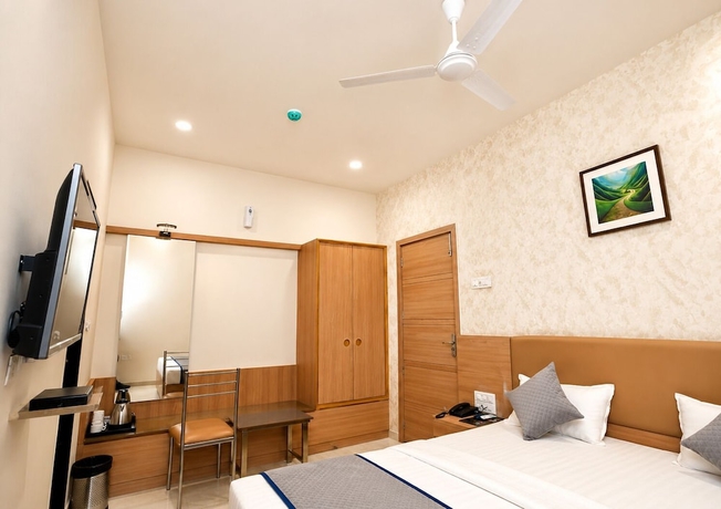 Imagen de la habitación del Hotel Akshar Imperial Morbi. Foto 9