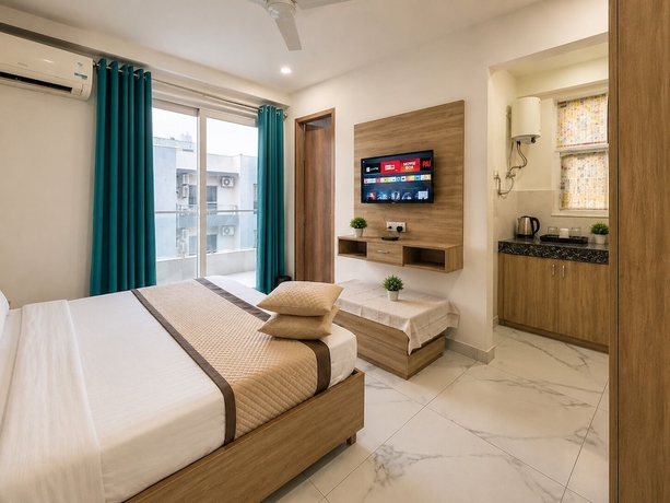 Imagen de la habitación del Hotel Akshay Dream Stay. Foto 2