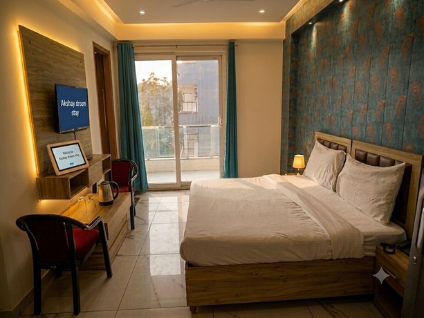 Imagen de la habitación del Hotel Akshay Dream Stay. Foto 8
