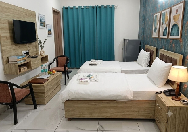 Imagen de la habitación del Hotel Akshay Dream Stay. Foto 13