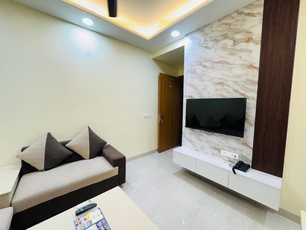 Imagen de la habitación del Hotel Akshay Premium Suites. Foto 6