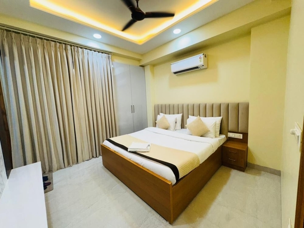 Imagen de la habitación del Hotel Akshay Premium Suites. Foto 11