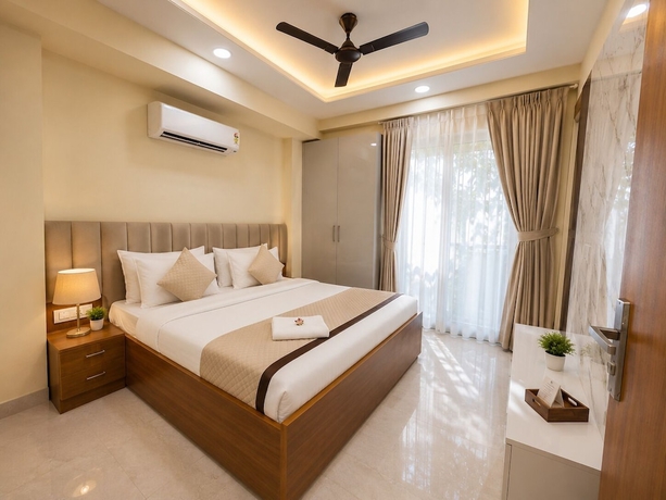 Imagen de la habitación del Hotel Akshay Premium Suites. Foto 12