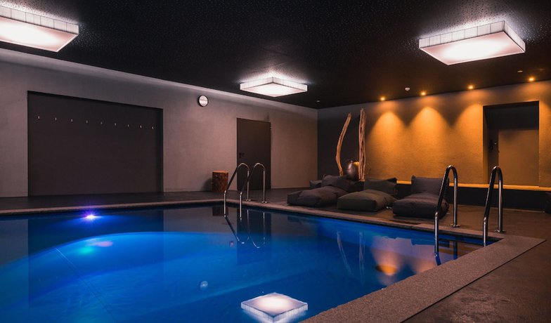 Imagen de la piscina del Hotel Aktiv and Familienhotel Adlernest. Foto 19