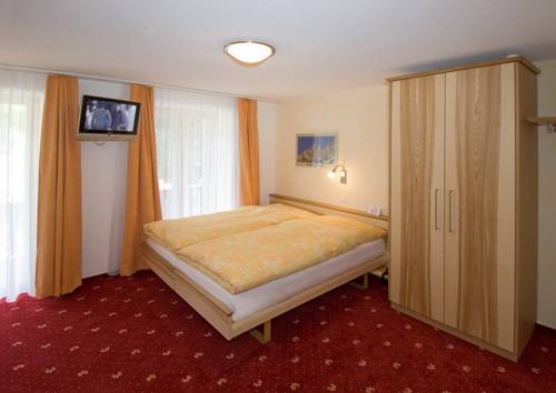 Imagen de la habitación del Hotel Aktiv and Spa Hannigalp. Foto 7