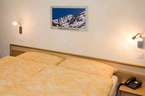 Imagen de la habitación del Hotel Aktiv and Spa Hannigalp. Foto 8