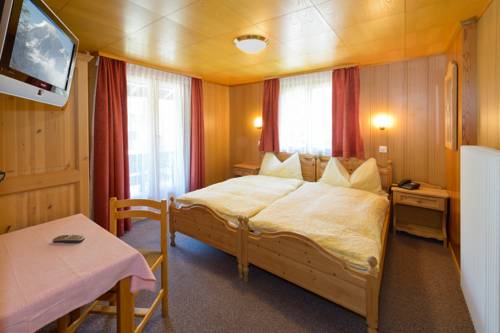 Imagen de la habitación del Hotel Aktiv and Spa Hannigalp. Foto 9