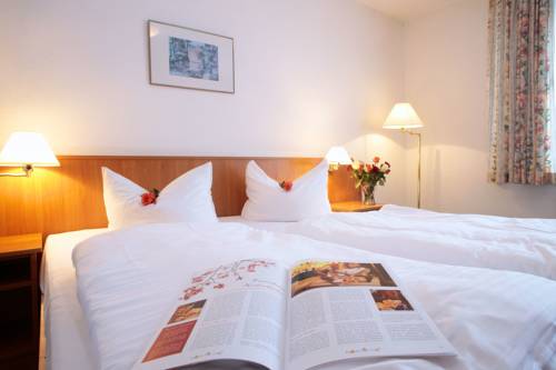 Imagen de la habitación del Hotel Akzent Zur Gr&uuml;nen Eiche. Foto 11