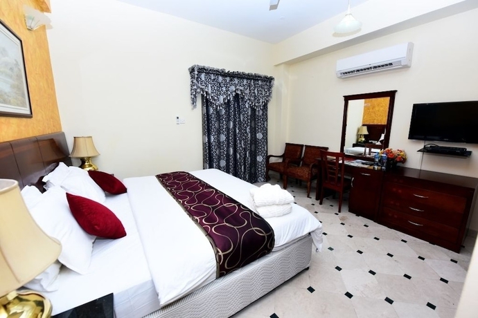 Imagen de la habitación del Hotel Al Bahjah. Foto 10