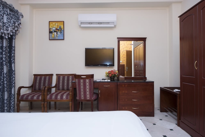 Imagen de la habitación del Hotel Al Bahjah. Foto 15