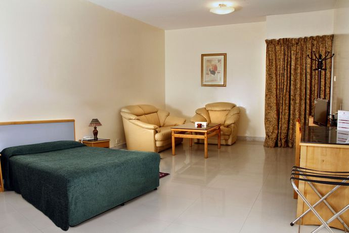 Imagen de la habitación del Hotel Al Buhairah Apartments. Foto 9