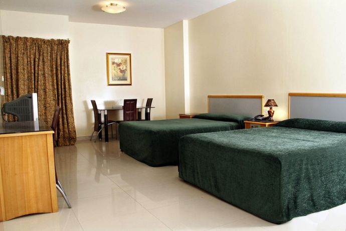 Imagen de la habitación del Hotel Al Buhairah Apartments. Foto 11