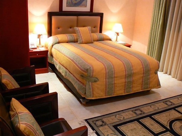 Imagen de la habitación del Hotel Al Bustan. Foto 11