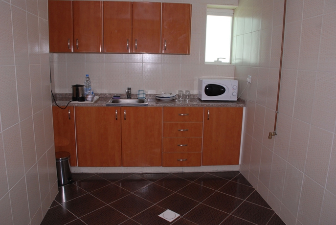 Imagen de la habitación del Hotel Al Bustan Tower Suites. Foto 9