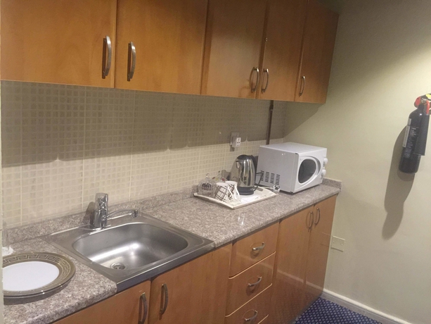 Imagen de la habitación del Hotel Al Bustan Tower Suites. Foto 10