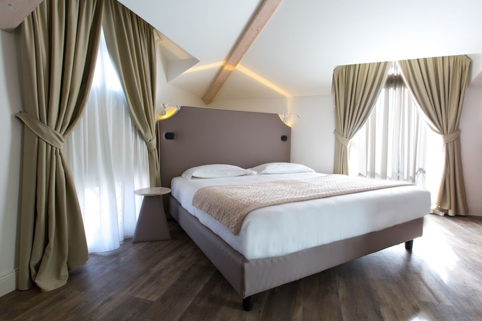 Imagen de la habitación del Hotel Al Campanile Aparthotel & Suite. Foto 7