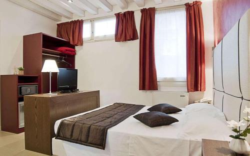 Imagen de la habitación del Hotel Al Canal Regio. Foto 13