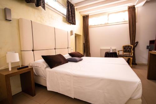 Imagen de la habitación del Hotel Al Canal Regio. Foto 16