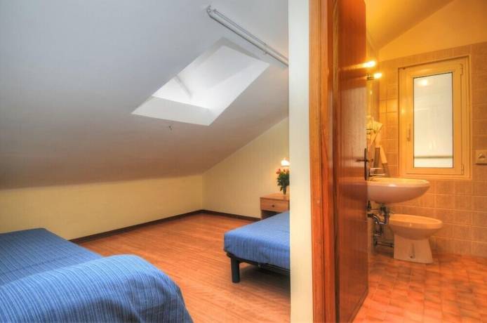 Imagen de la habitación del Hotel Al Cavallino Bianco, Lignano Sabbiadoro. Foto 4